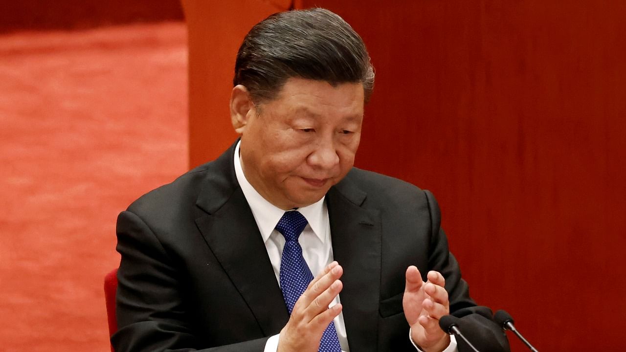 Chinese President Xi Jinping applauds at a meeting commemorating the 110th anniversary of Xinhai Revolution at the Great Hall of the People in Beijing, China October 9, 2021. Credit: Reuters Photo