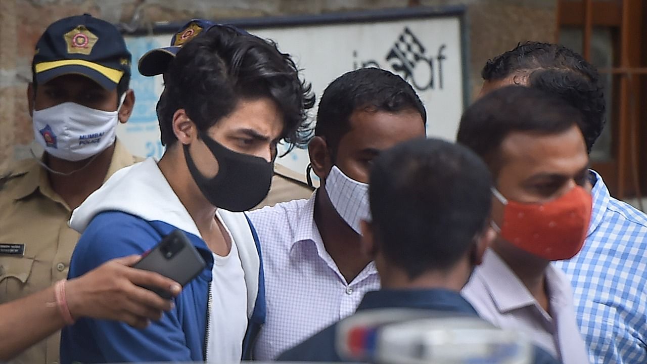 Shahrukh Khan's son Aryan Khan being taken to Arthur Road jail from Narcotics Control Bureau (NCB) office in Mumbai. Credit: PTI Photo