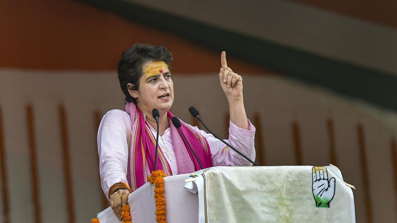 Congress General Secretary Priyanka Gandhi gestures to the crowd as she addresses during 'Kisan Nyay' rally, ahead of UP Assembly Elections 2022, in Varanasi. Credit: PTI photo
