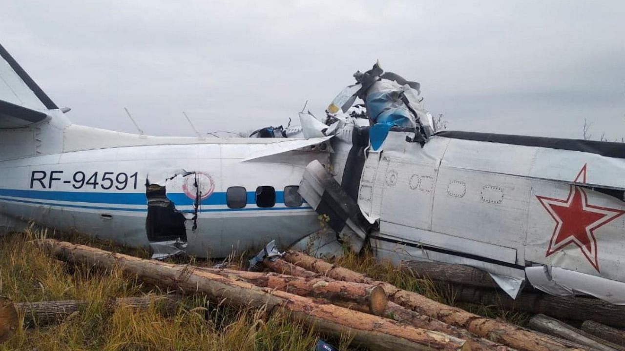 The wreckage of the L-410 plane is seen at the crash site near the town of Menzelinsk in the Republic of Tatarstan, Russia October 10, 2021. Credit: Russia's Emergencies Ministry/Handout via Reuters