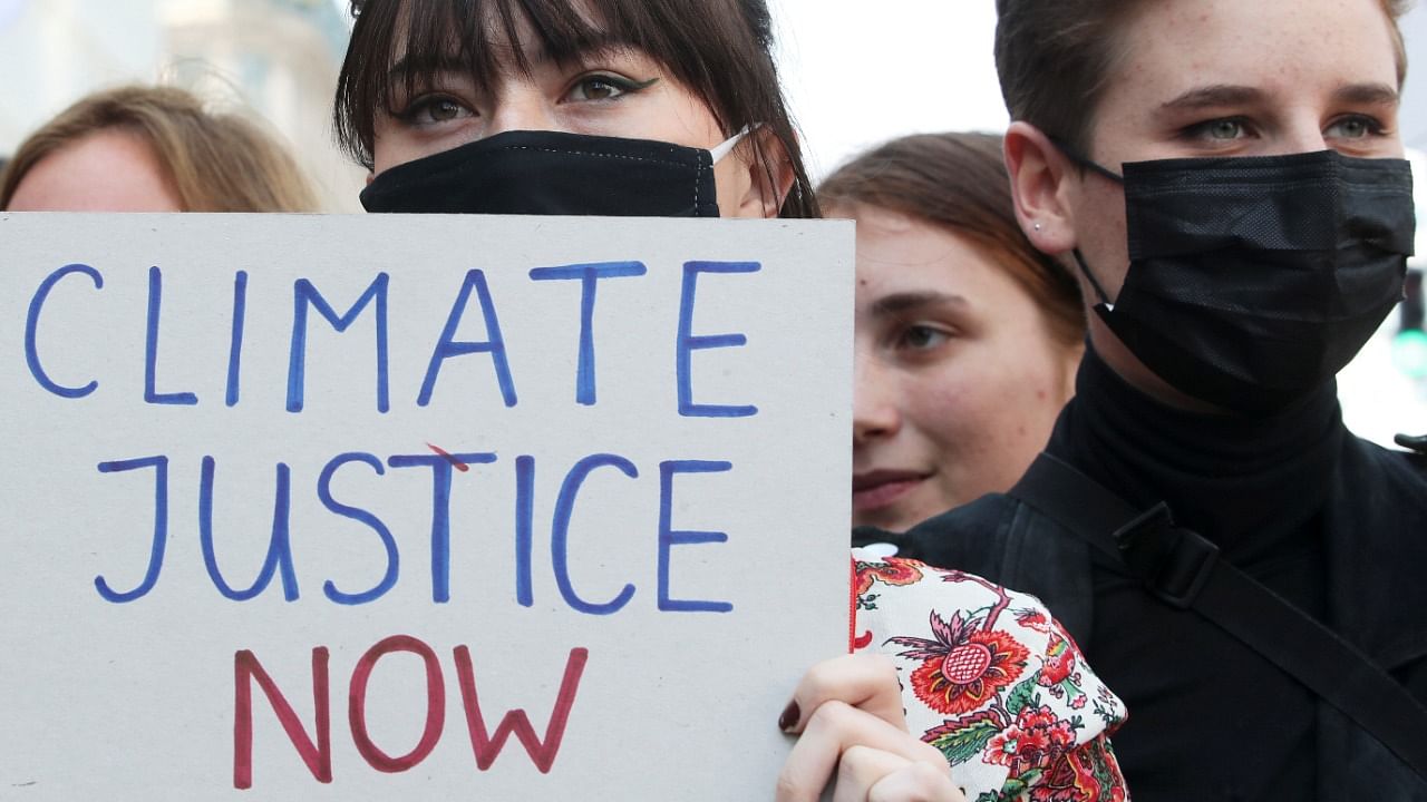 Climate activist Anuna De Wever takes part among others in a Climate March ahead of the COP26 climate summit, in Brussels, Belgium October 10, 2021. Credit: Reuters Photo