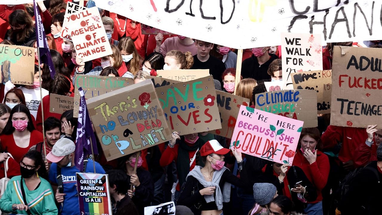 Protesters take part in a demonstration against climate change in Brussels, on October 10, 2021, ahead of the COP26 climate summit. Credit: PTI Photo