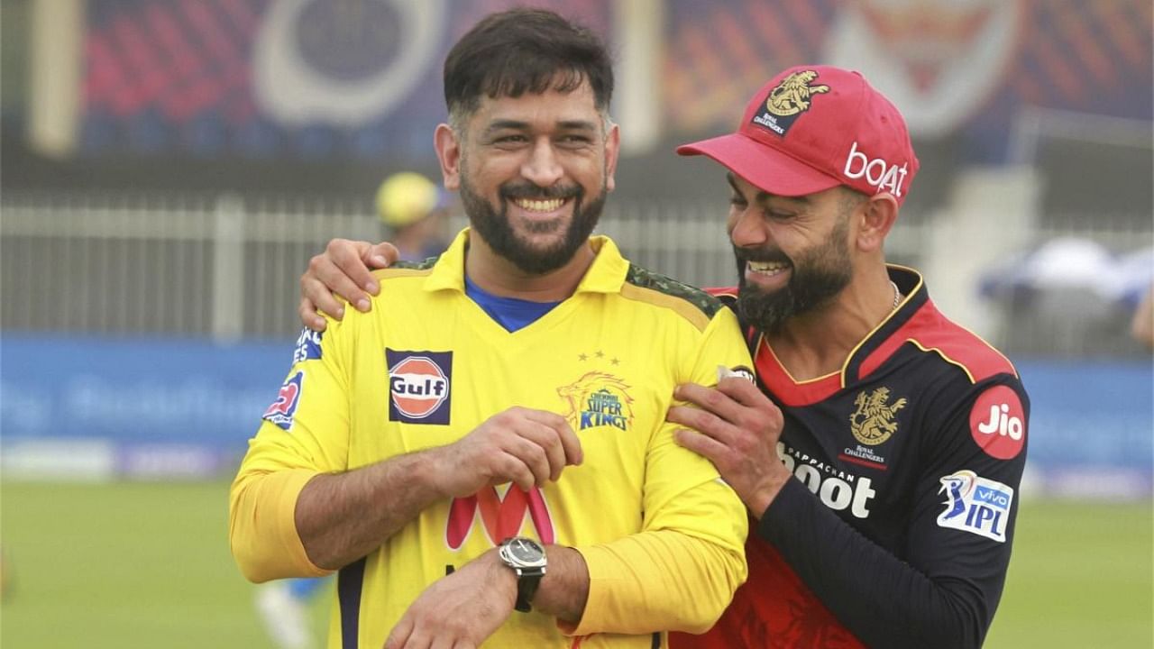  Virat Kohli captain of Royal Challengers Bangalore and Mahendra Sigh Dhoni captain of Chennai Super Kings. Credit: PTI Photo