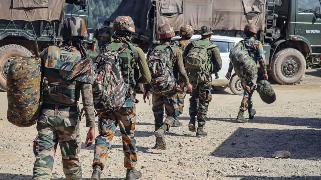  Security personnel at the encounter site near Dehra Ki Gali area in Poonch district. Credit: PTI Photo