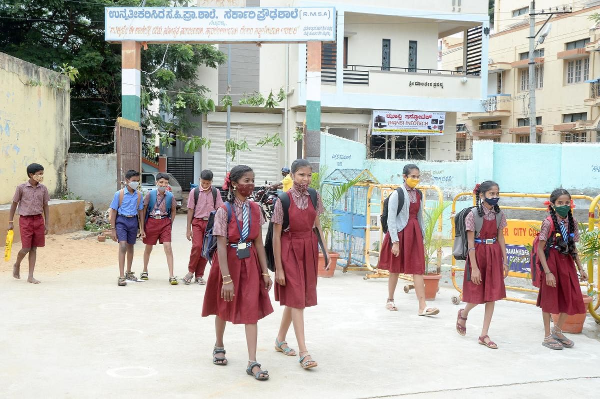 Midday meals are set to resume at schools after Dasara vacation. Credit: DH File Photo