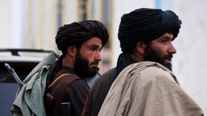 Both the Taliban and IS advocate rule by their radical interpretations of Islamic law. But there are key ideological differences. Credit: AFP Photo