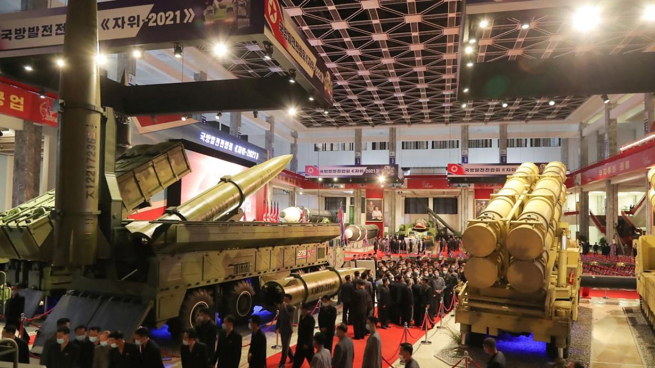 People attend the Defence Development Exhibition at the Three-Revolution Exhibition House in Pyongyang, North Korea. Credit: Reuters Photo
