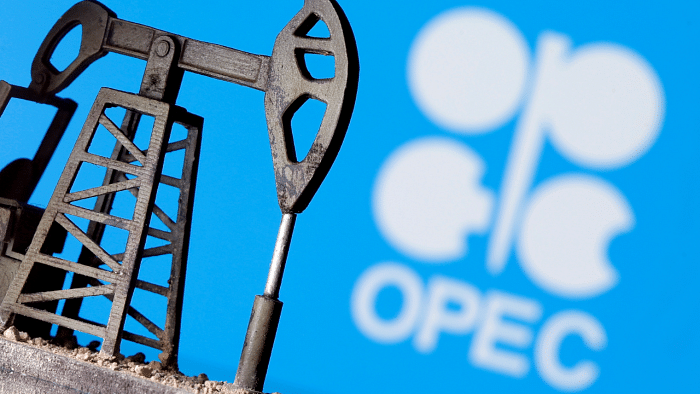 A 3D-printed oil pump jack is seen in front of displayed OPEC logo. Credit: Reuters Photo