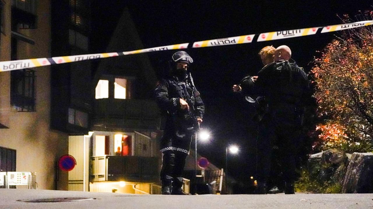 Police officers investigate after several people were killed and others were injured by a man using a bow and arrows to carry out attacks, in Kongsberg, Norway. Credit: Reuters Photo