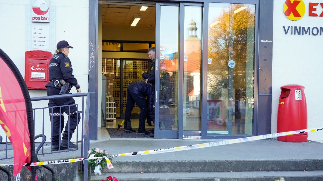 Police officers investigate at the Extra grocery store in Norway. Credit: Reuters Photo