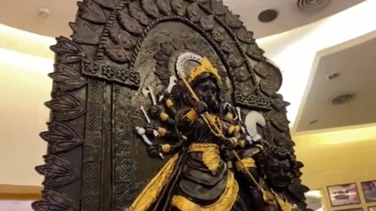 The handcrafted 4-foot-high Goddess Durga idol made of Belgian chocolate evoked tremendous curiosity among revellers. Credit: Twitter/@Tamal0410