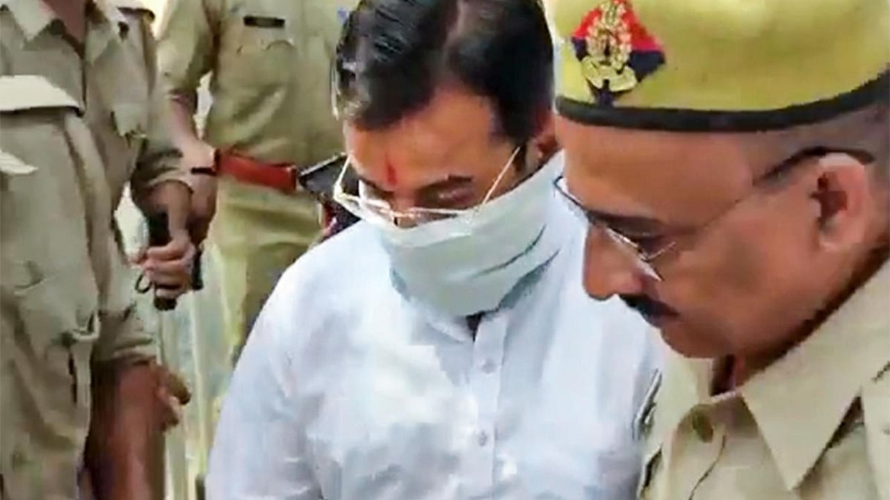 Ashish Mishra, accused in the Tikonia violence case, arrives at the Crime Branch office in Lakhimpur Kheri, Saturday. Credit: PTI Photo