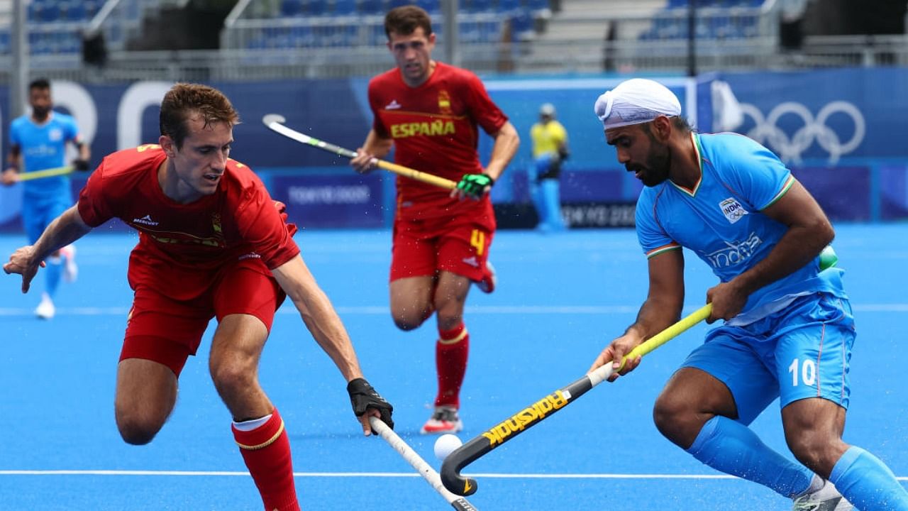 Simranjeet Singh of India in action against Llorenc Piera of Spain at the Tokyo 2020 Olympics. Credit: Reuters File Photo