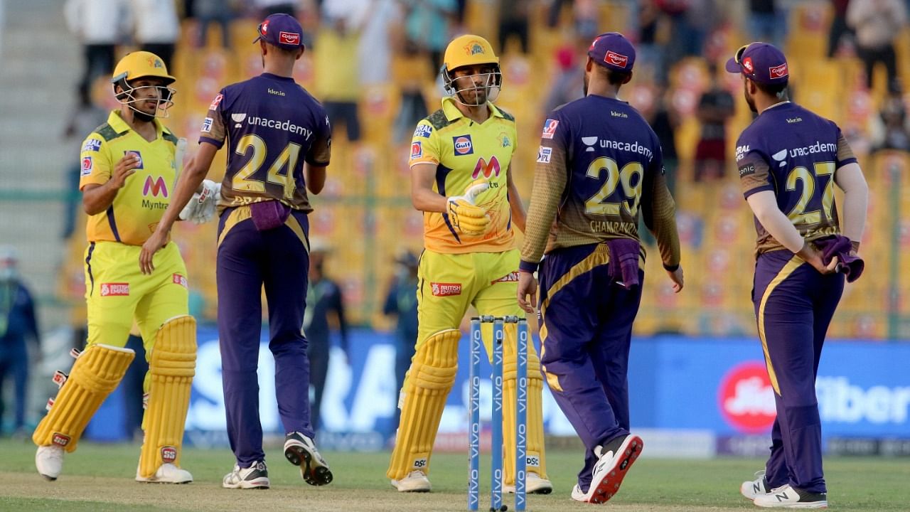 Chennai Super Kings and Kolkata Knight Riders players shake hands after match 38 of the Indian Premier League between the Chennai Super Kings and the Kolkata Knight Riders, at the Sheikh Zayed Stadium, Abu Dhabi in the United Arab Emirates, Sunday. Credit: PTI File Photo