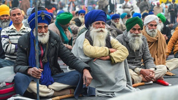Farmers during the ongoing protest against the new farm laws, at Singhu border. Credit: PTI File Photo