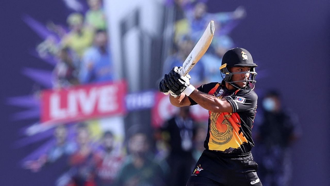 Papua New Guinea's captain Assad Vala plays a shot during the ICC men’s Twenty20 World Cup match against Oman. Credit: AFP Photo