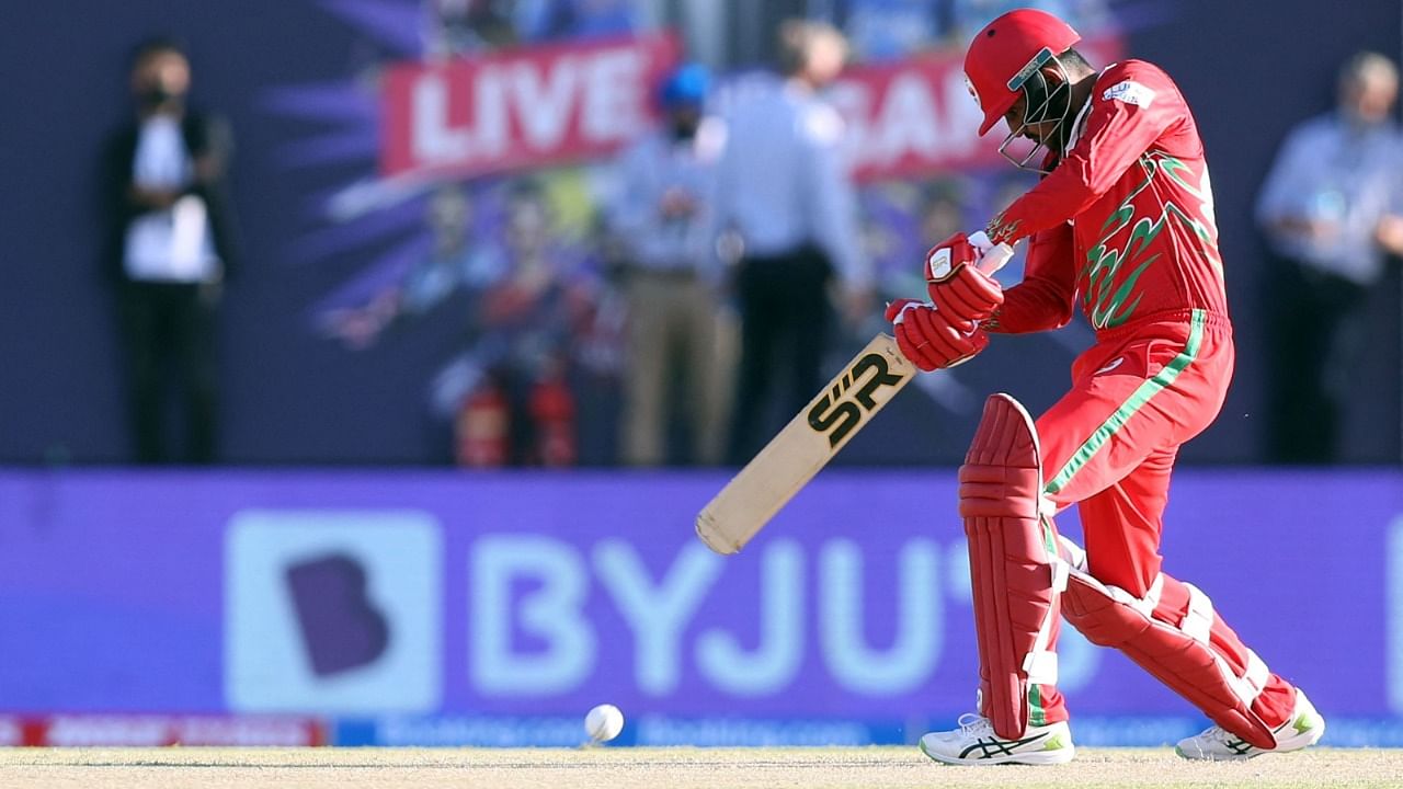 Oman's Jatinder Singh plays a shot during the ICC men’s Twenty20 World Cup cricket match between Oman and Papua New Guinea. Credit: AFP Photo