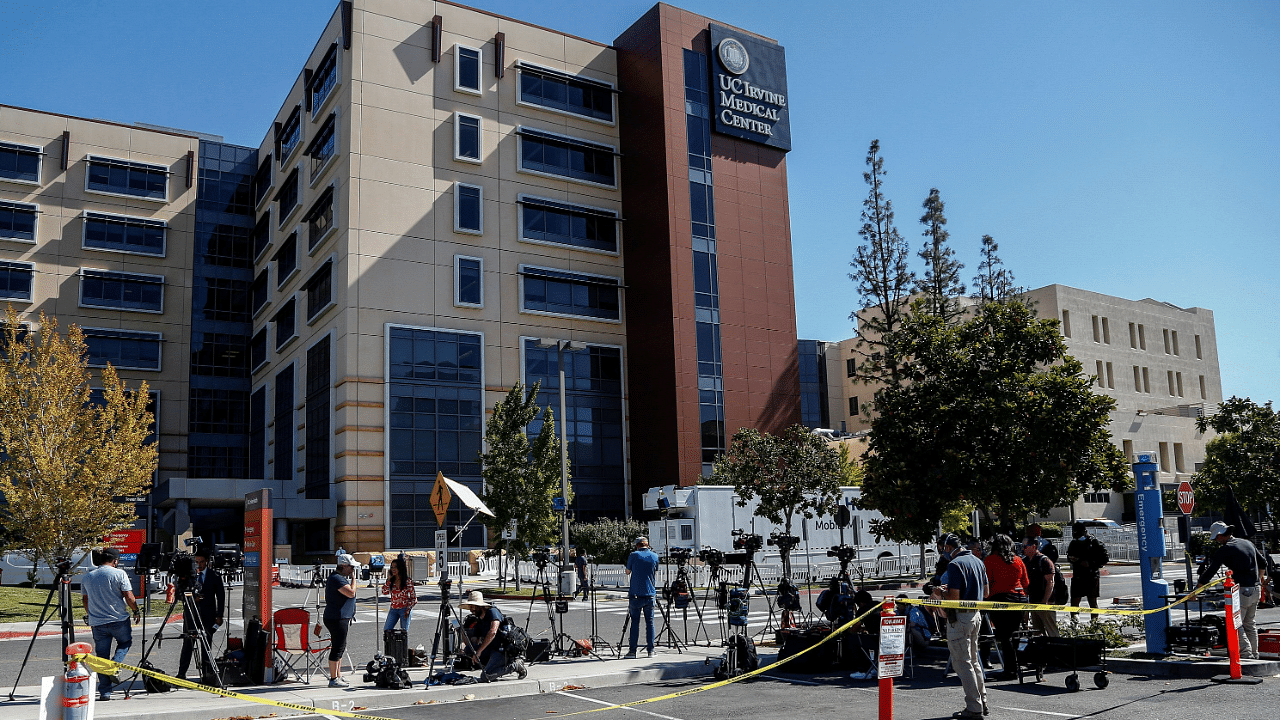 Members of media wait outside University of California Irvine Medical Center after it was announced that former U.S. President Bill Clinton was admitted to the hospital in Orange. Credit: Reuters Photo