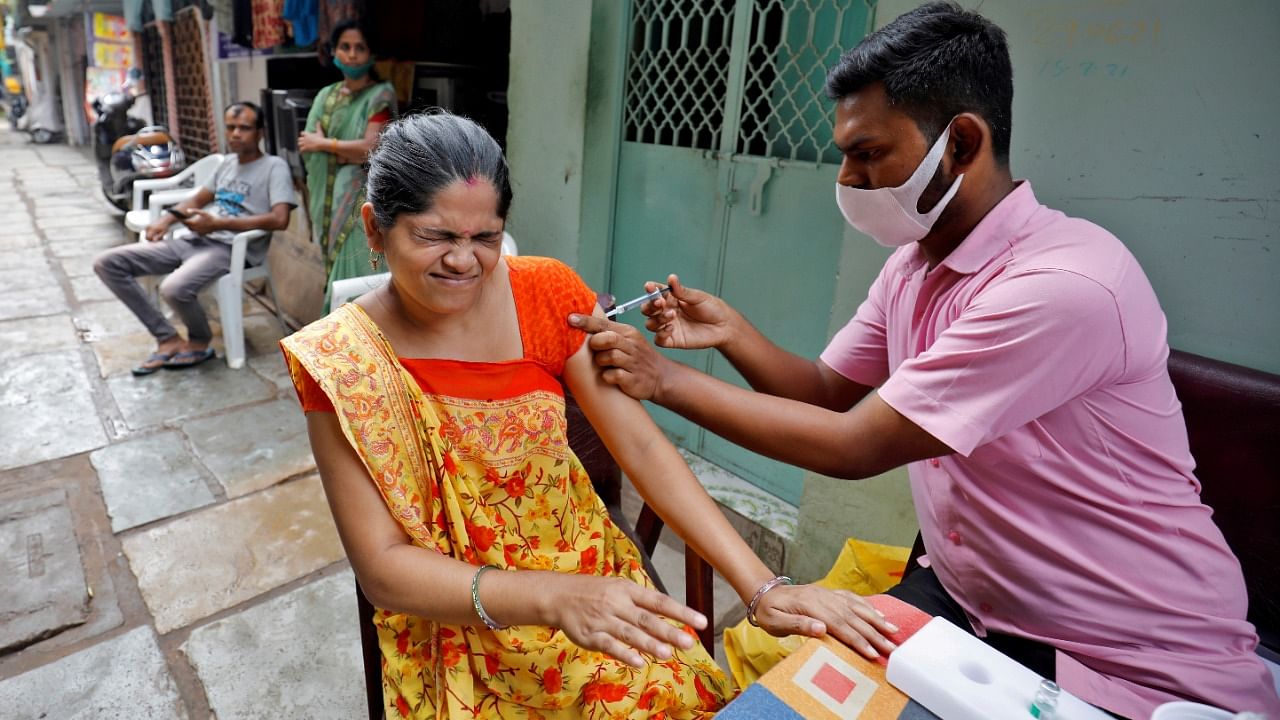 Daily vaccinations have dropped to an average of 50 lakh doses this month and even less in the past week, off a daily peak of 2.5 crore last month. Credit: Reuters File Photo