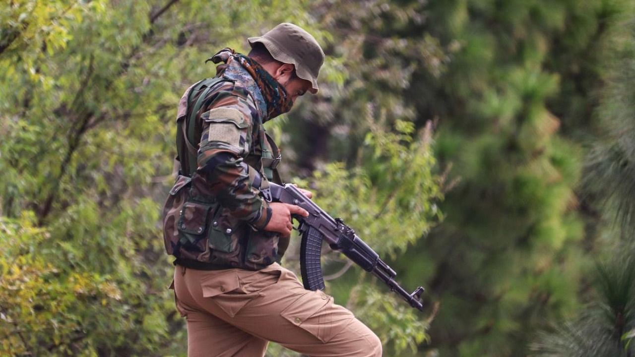 Security personnel stand guard near the encounter site at Nar Khas area of Mendhar in Poonch district. Credit: PTI Photo