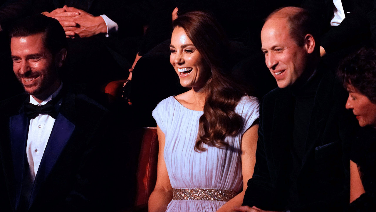 Britain's Prince William, Duke of Cambridge, (R) and Britain's Catherine, Duchess of Cambridge, (C) smile as they attend the inaugural Earthshot Prize awards ceremony at Alexandra Palace. Credit: AFP Photo