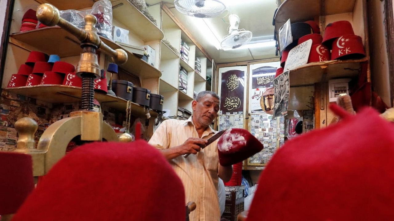 Abdel Basset from Cairo is one of Egypt's last fez makers. Credit: Reuters Photo