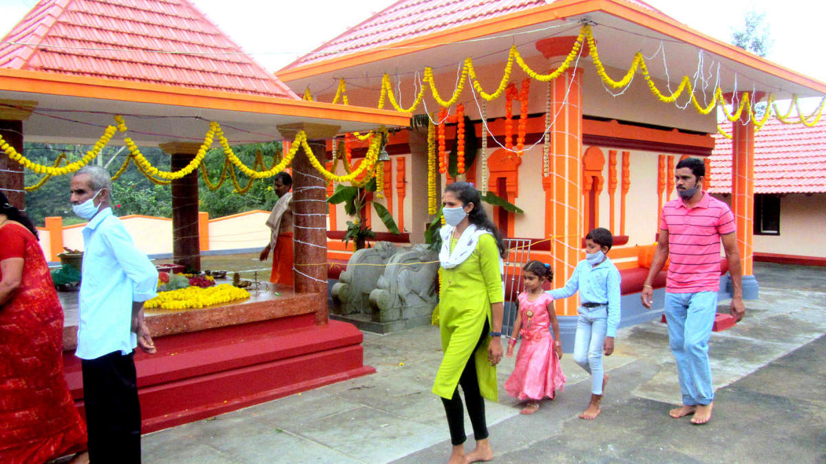 Devotees visit Cauvery Kanvamunishwara Temple in Balamuri near Napoklu, on the occasion of the Balamuri fair.