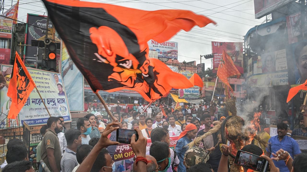 Bajrang Dal members stage a protest against the recent killings of Hindus and vandalism of a Durga idol by miscreants in Bangladesh, at Krishnanagar in Nadia. Credit: PTI Photo