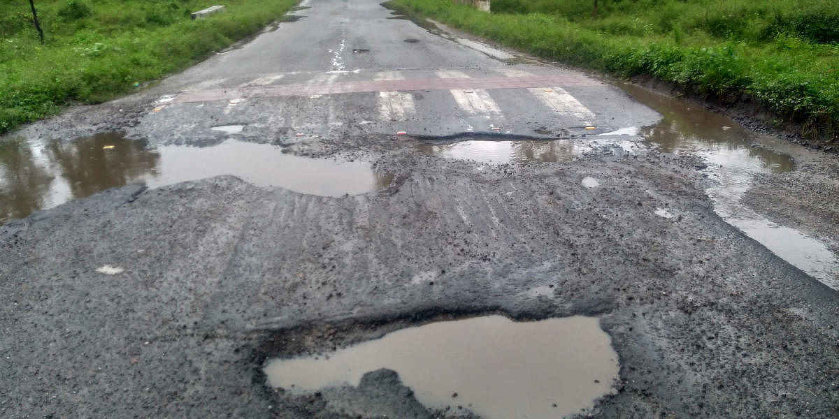 The pothole-ridden Aanechowkoor Road.
