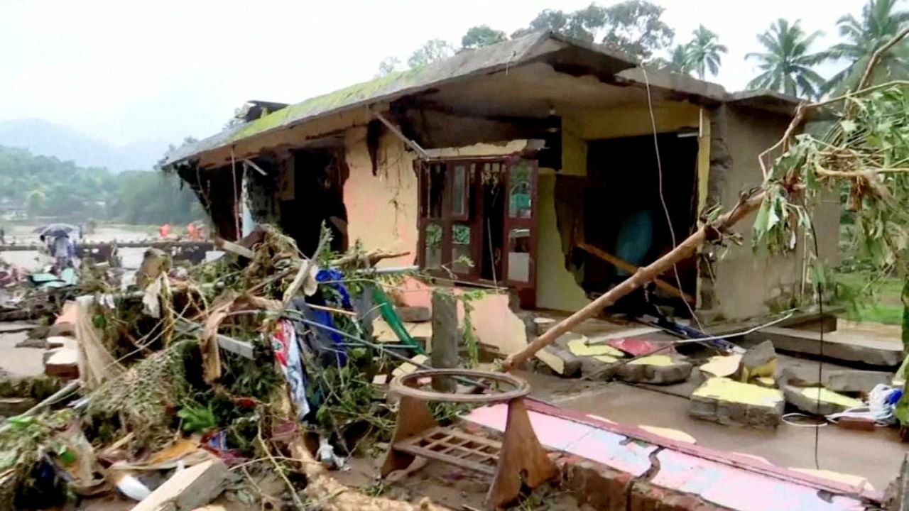 A general view of a house damaged in the heavy rains received in Kottayam, Kerala, India, October 17, 2021 in this still image taken from video on October 18, 2021. Credit: Reuters Photo