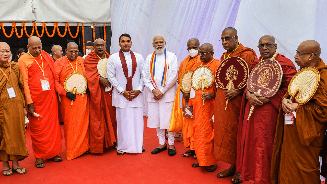 Prime Minister Narendra Modi meets Sri Lankan delegation on the occasion of the Abhidhamma Day in Kushinagar. Credit: PTI Photo