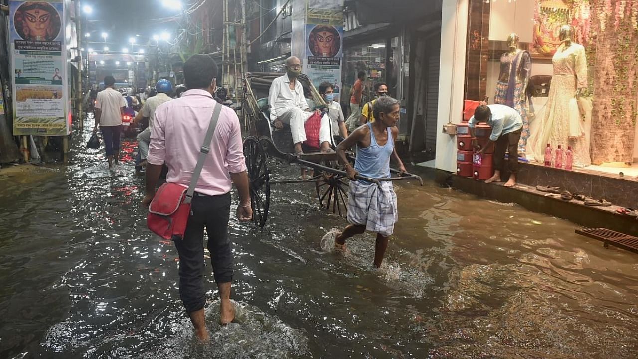 Several low-lying areas in Jalpaiguri district have been flooded owing to a rise in the water level of Teesta and Jaldhaka rivers. Credit: PTI Photo