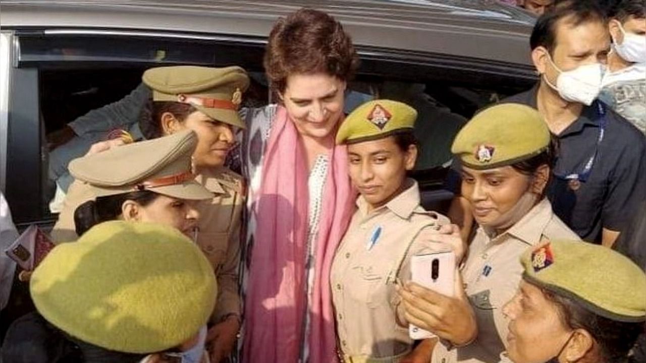 Women police personnel take a selfie with Congress General Secretary Priyanka Gandhi Vadra. Credit: PTI Photo