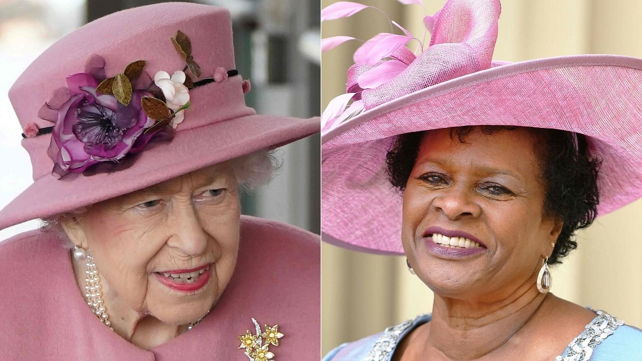 Britain's Queen Elizabeth II (L) and Sandra Mason. Credit: AFP Photo
