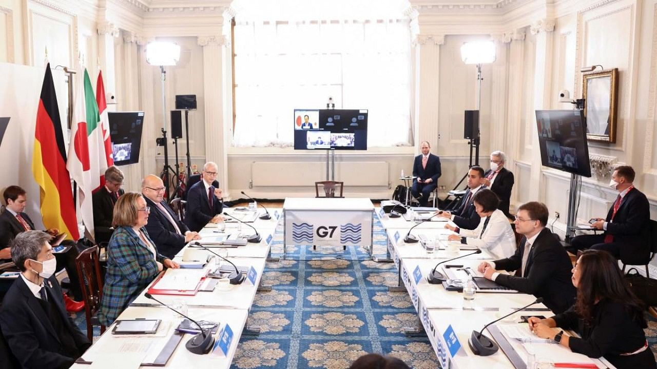 Britain's International Trade Secretary Anne-Marie Trevelyan (2ndL) chairs a G7 trade meeting. Credit: AFP Photo