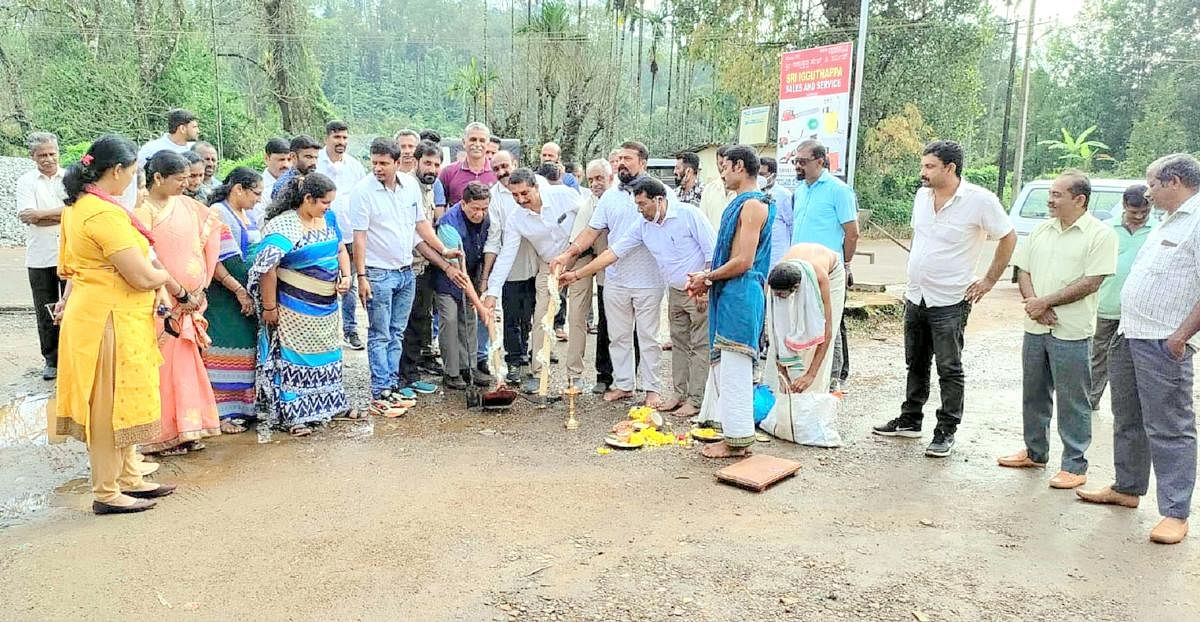 Virajpet MLA K G Bopaiah initiates road development works in Kakkabbe Gram Panchayat limits, on Friday.