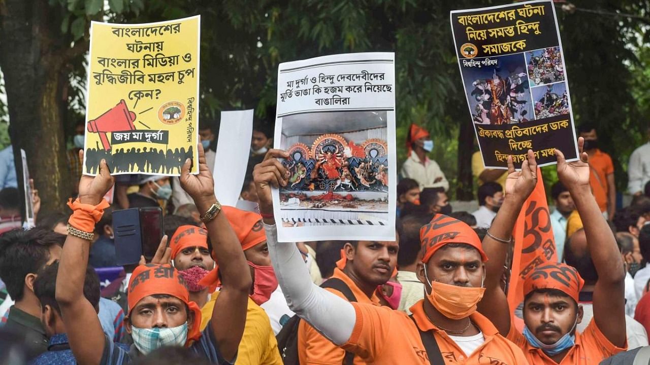 Vishwa Hindu Parishad workers protest against the alleged attack on the ISKCON temple in Bangladesh, in Kolkata, Tuesday, Oct. 19, 2021. Credit: PTI Photo