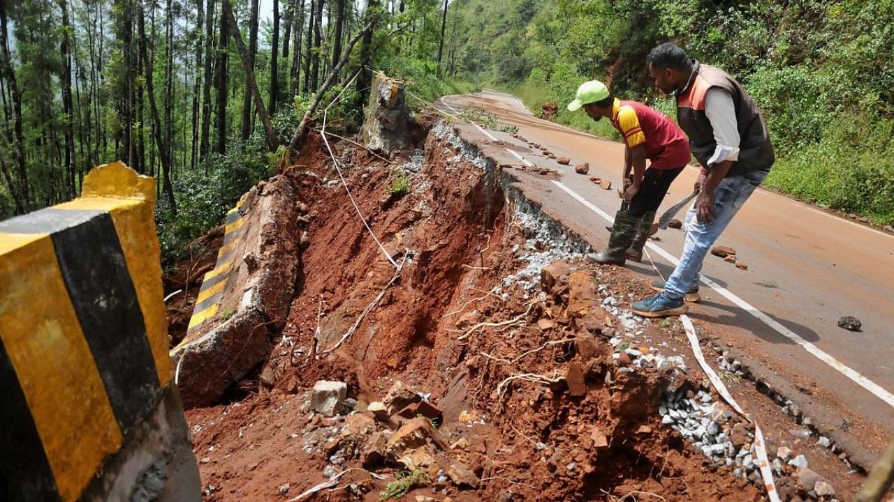 A damaged road after a landslide due to heavy rain near Chikmagalur. Credit: PTI Photo