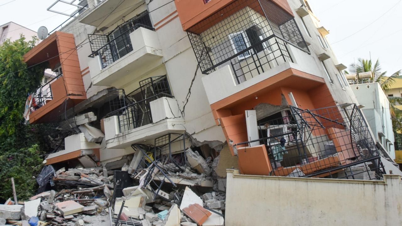 An apartment complex in Kasturinagar, East Bengaluru, that first tilted before eventually giving way in early October. Credit: DH File Photo