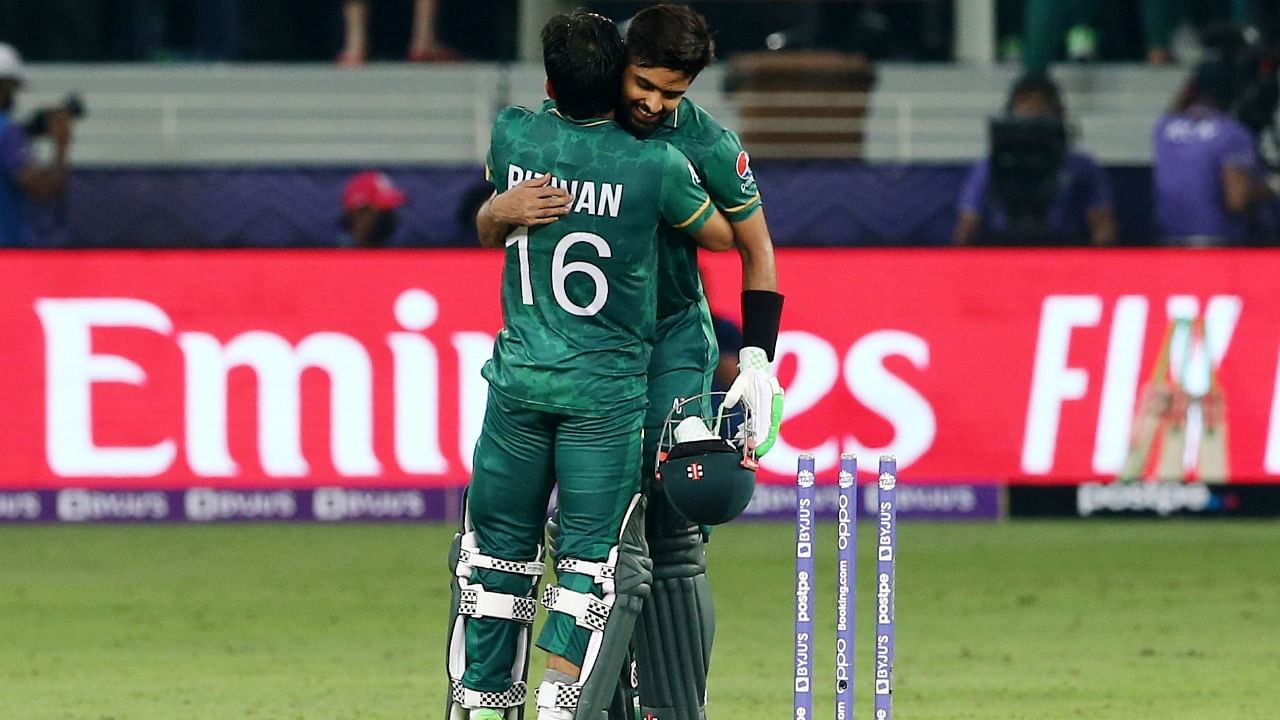 Pakistan's Mohammad Rizwan and Babar Azam celebrate after winning the match. Credit: Reuters Photo