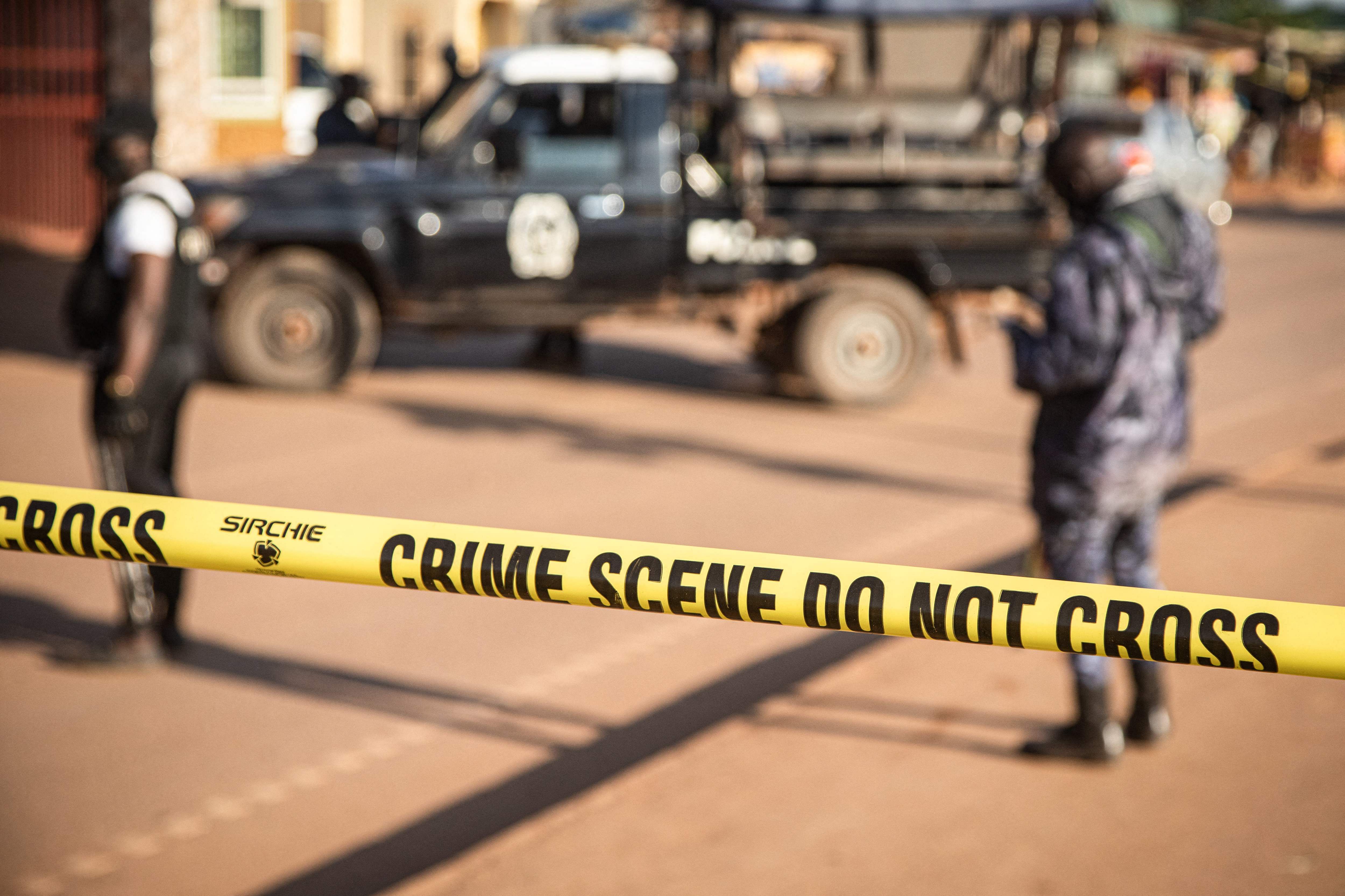 A crime scene following a bomblast last night is secured by the Ugandan police in Kampala. Credit: AFP Photo