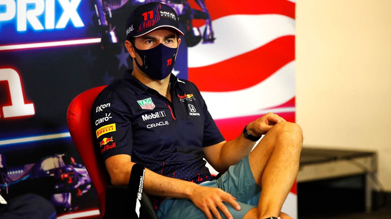 Red Bull's Mexican driver Sergio Perez speaks during a press conference after the Formula One United States Grand Prix at the Circuit of The Americas in Austin, Texas, on October 24, 2021. Credit: AFP Photo