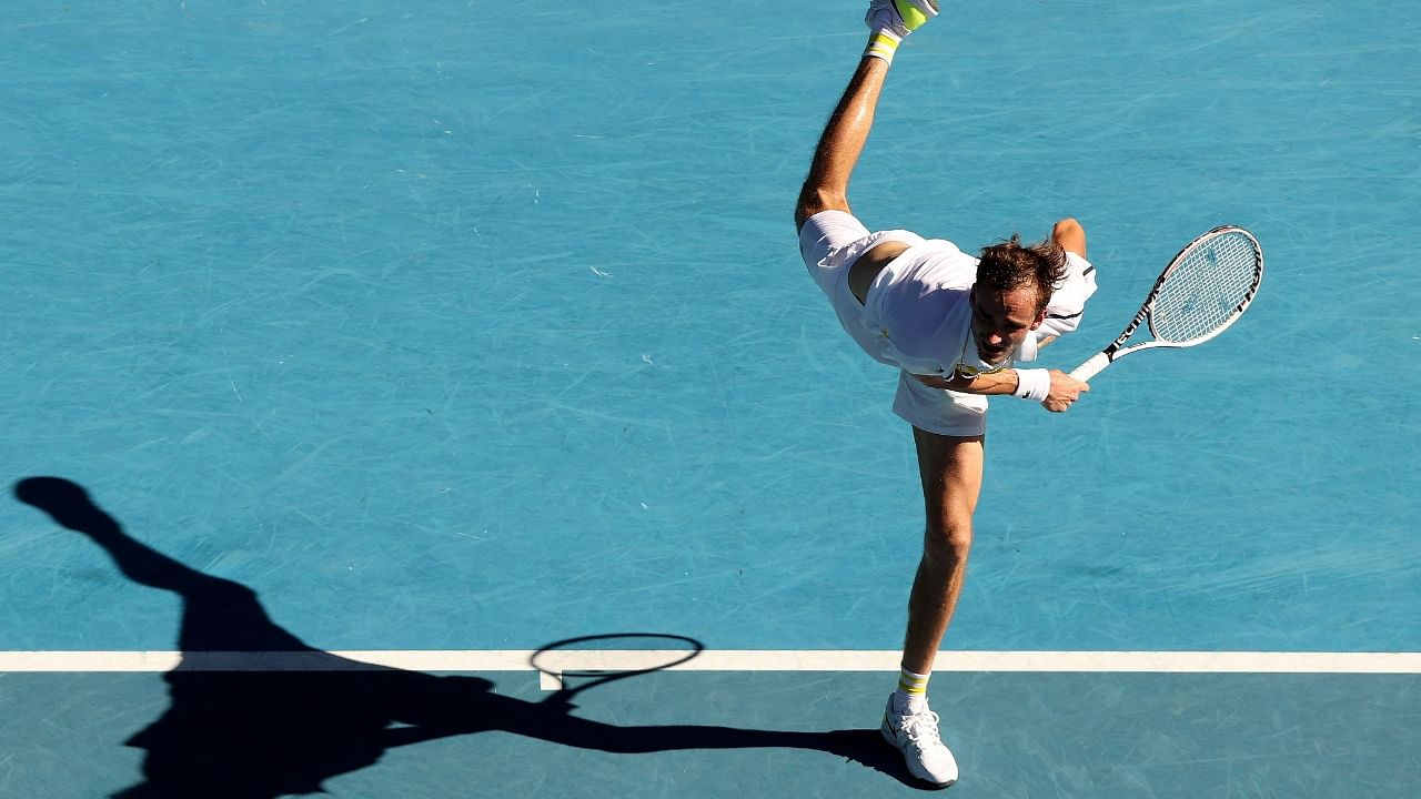 Russia's Daniil Medvedev serves during the men's singles quarter-final match against Russia's Andrey Rublev on day ten of the Australian Open tennis tournament in Melbourne on February 17, 2021. Credit: AFP File Photo