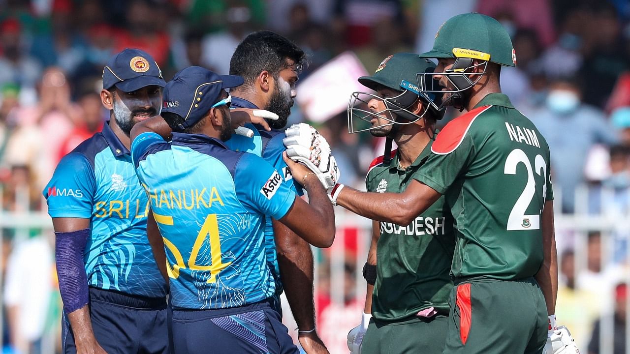 Bangladesh's Liton Das, second right, has altercation with Sri Lankan bowler Lahiru Kumara