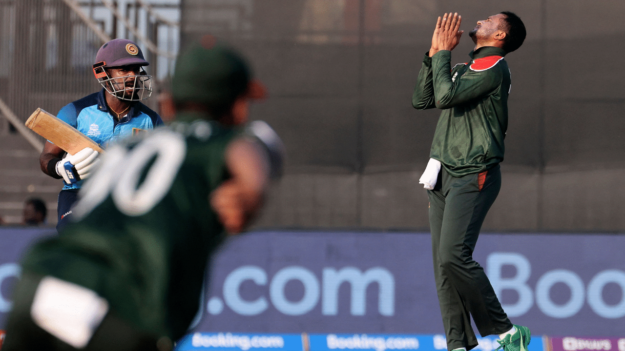 Bangladesh's Shakib Al Hasan (R) reacts during the ICC men’s Twenty20 World Cup cricket match between Sri Lanka and Bangladesh. Credit: AFP Photo