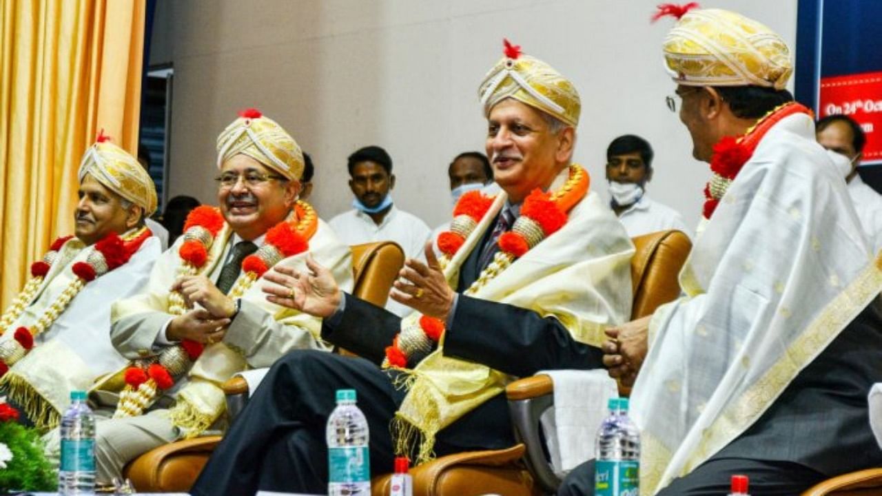Supreme Court Judge Justice Uday U Lalit (centre) speaks at a programme organised by the legal services authority in Kalaburagi on Sunday. Credit: DH Photo