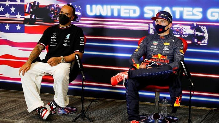 Mercedes' Lewis Hamilton, 2nd position and Red Bull's Max Verstappen, 1st position during a press conference after the United States Grand Prix. Credit: FIA/Handout via Reuters