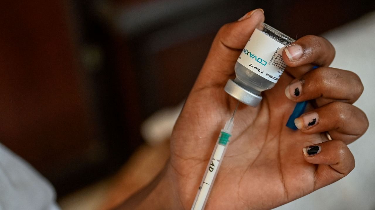A nurse prepares a dose of the Covaxin Covid-19 vaccine. Credit: AFP File Photo