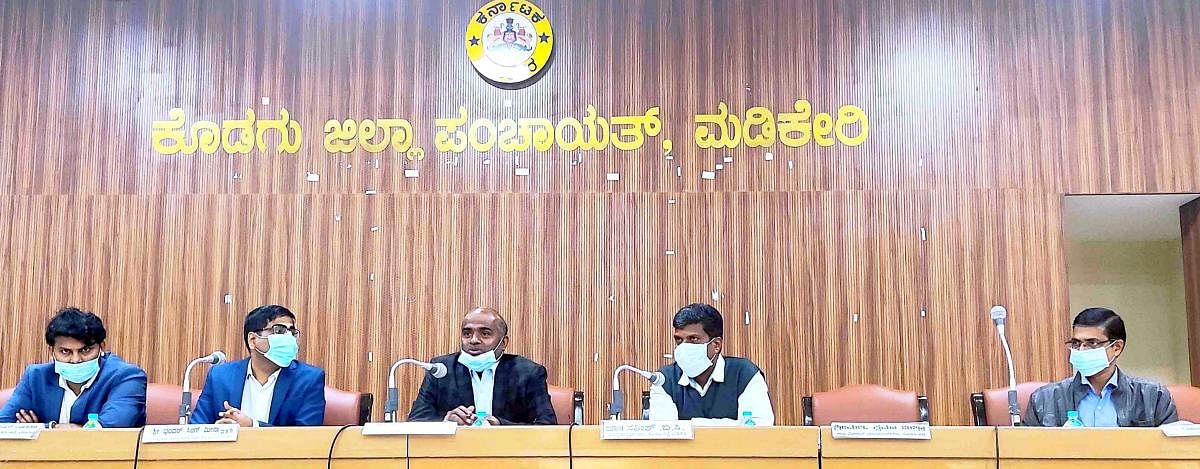 Kodagu District In-charge Secretary V Anbu Kumar conducts a review meeting in Madikeri on Tuesday. DH Photo