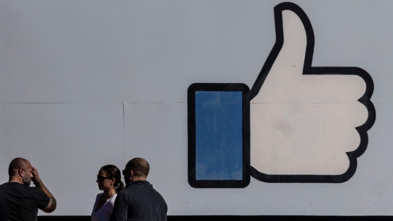 Apart from the Like button, Facebook has scrutinized its share button, which lets users instantly spread content posted by other people. Credit: Reuters Photo